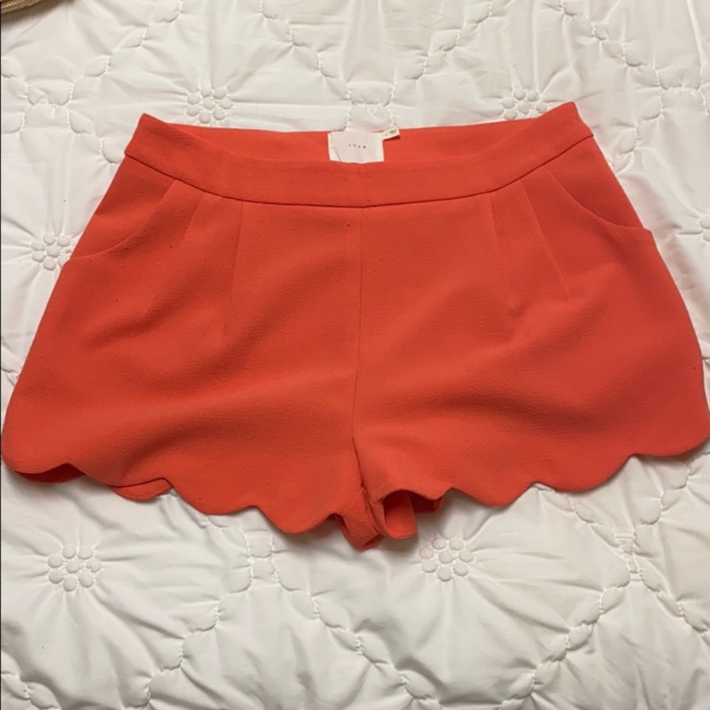 Lush coral scalloped shorts